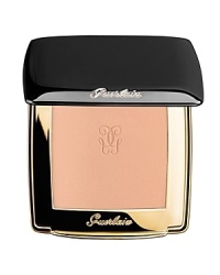 Rejuvenating Golden Light Foundation Guerlain introduces a foundation that revives and illuminates the skin, restoring luster and revitalizing skin in the long term, thanks to the exclusive double-sided Gold Radiance Pigment. The opaque side targets imperfections and dull zones, while the golden side reflects light. Combined with the regenerating properties of Myrrh Oil, and the lifting and smoothing properties of Peptides, long-term results include the diminishment of fine lines and smoother, softer skin.This luxurious new texture is mid-way between a foundation and a pressed powder, perfect for achieving a comfortable wear and a hold that lasts all day without settling into fine lines. Its creamy, soft texture glides on and its satiny finish allows it to blend seamlessly with the skin. Available in 6 shades. Rejuvenating Golden Light Foundation Guerlain introduces a foundation that revives and illuminates the skin, restoring luster and revitalizing skin in the long term, thanks to the exclusive double-sided Gold Radiance Pigment. The opaque side targets imperfections and dull zones, while the golden side reflects light. Combined with the regenerating properties of Myrrh Oil, and the lifting and smoothing properties of Peptides, long-term results include the diminishment of fine lines and smoother, softer skin.This luxurious new texture is mid-way between a foundation and a pressed powder, perfect for achieving a comfortable wear and a hold that lasts all day without settling into fine lines. Its creamy, soft texture glides on and its satiny finish allows it to blend seamlessly with the skin. Available in 6 shades.