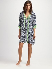 EXCLUSIVELY AT SAKS. Lightweight and summer-ready, a bold geometric print in fresh hues covers this classic silhouette. Cross-over frontThree-quarter kimono sleevesContrast trim at neckline and cuffsSelf-tie waistAbout 36 from shoulder to hemPolyesterMachine washImported