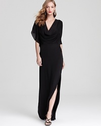 Exuding timeless glamour, Halston Heritage's flutter sleeve gown lends sophisticated chic in classic black. Exuding timeless glamour, Halston Heritage's flutter sleeve gown lends sophisticated chic in classic black.