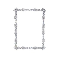 Rich in vintage appeal, this scintillating piece features hand-set Swarovski crystal detailing. Rich in vintage appeal, this scintillating piece features hand-set Swarovski crystal detailing.