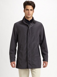 A simple silhouette that exudes the ideal balance of superior fit and functionality, expertly tailored in a water-repellent and fully-lined fabric.Zip frontSnap-button placketStand collarSide slash pocketsFully linedAbout 34 from shoulder to hemPolyesterDry cleanImported A simple silhouette that exudes the ideal balance of superior fit and functionality, expertly tailored in a water-repellent and fully-lined fabric.Zip frontSnap-button placketStand collarSide slash pocketsFully linedAbout 34 from shoulder to hemPolyesterDry cleanImported
