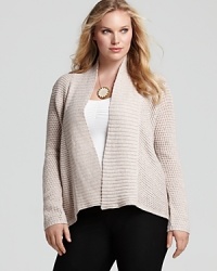 Slip on this slouchy Eileen Fisher shawl collar cardigan when you're running errands or to a meeting--the versatile and warm silhouette works well with everything from denim to a sleek pencil skirt. Slip on this slouchy Eileen Fisher shawl collar cardigan when you're running errands or to a meeting--the versatile and warm silhouette works well with everything from denim to a sleek pencil skirt.