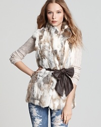 Constructed from luxe, multi-colored rabbit fur, this 525 America vest, ties at the waist for a cinched silhouette, and offers a classic ski chalet look. Constructed from luxe, multi-colored rabbit fur, this 525 America vest, ties at the waist for a cinched silhouette, and offers a classic ski chalet look.