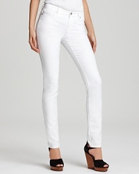 Gleaming silver-toned signature accents enhance the crisp white hue of these MICHAEL Michael Kors jeans, cut in a slim silhouette for an all-around on-trend look. Gleaming silver-toned signature accents enhance the crisp white hue of these MICHAEL Michael Kors jeans, cut in a slim silhouette for an all-around on-trend look.