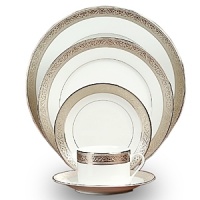 The finest Limoges porcelain and ornate scrollwork in a single polished platinum band add glittering distinction to any elegant table. The finest Limoges porcelain and ornate scrollwork in a single polished platinum band add glittering distinction to any elegant table.
