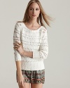 Featuring an open weave and semi-sheer texture, this Rebecca Minkoff sweater is a favorite of the season. Endlessly chic with a pair of printed shorts, it's a charming investment for summer and beyond.