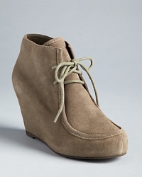 Lace into the bootie trend in DV Dolce Vita's platform wedges. Lace into the bootie trend in DV Dolce Vita's platform wedges.