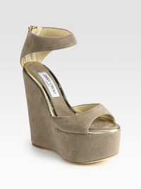 Velvety suede with metallic leather trim adds a formal touch to this casual-chic wedge. Self-covered wedge, 5½ (140mm)Covered platform, 2 (50mm)Compares to a 3½ heel (90mm)Suede and metallic leather upperBack zipperLeather and suede liningLeather solePadded insoleMade in ItalyOUR FIT MODEL RECOMMENDS ordering one half size up as this style runs small. Velvety suede with metallic leather trim adds a formal touch to this casual-chic wedge. Self-covered wedge, 5½ (140mm)Covered platform, 2 (50mm)Compares to a 3½ heel (90mm)Suede and metallic leather upperBack zipperLeather and suede liningLeather solePadded insoleMade in ItalyOUR FIT MODEL RECOMMENDS ordering one half size up as this style runs small.
