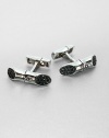 Sterling silver cuff links with black sapphires make a definitive statement to your stylish suiting wardrobe.Sterling silver/black sapphireAbout ¼ x 1.Imported