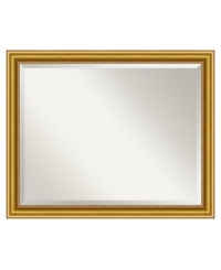 With a beveled edge and radiant frame, the Townhouse Gold wall mirror is a reflection of extraordinary taste. Subtle beading accents the inner edge for an added touch of finery. Sized to impress, it's thoroughly stunning in an entranceway or dining room. With a beveled edge and radiant frame, the Townhouse Gold wall mirror is a reflection of extraordinary taste. Subtle beading accents the inner edge for an added touch of finery. Sized to impress, it's thoroughly stunning in an entranceway or dining room.