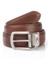 Sleek, smooth and ready for anything, this Tommy Hilfiger belt reverses from brown to black to do double duty in your wardrobe.