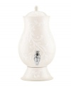 With an elegant white-on-white pattern featuring an embossed vine motif and radiant glaze, the Opal Innocence Carved beverage dispenser adds easy refinement to anytime entertaining.