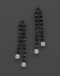 Twinned drops of faceted diamonds and black sapphires set in 18K. white gold. By Roberto Coin.