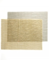 Loosely woven, slightly iridescent and organic in feel, design sensation Sandy Chilewich's lattice placemat imparts a fresh, contemporary perspective to any table. Fashioned in durable vinyl-coated polyester. Loosely woven, slightly iridescent and organic in feel, design sensation Sandy Chilewich's lattice placemat imparts a fresh, contemporary perspective to any table. Fashioned in durable vinyl-coated polyester.
