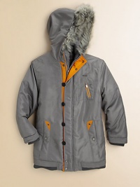 Soft faux fur trims the hood of a mini version of the classic parka, styled with contrast tape trim Soft faux fur trims the hood of a mini version of the classic parka, styled with contrast tape trim
