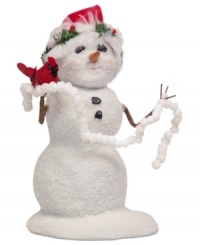 A glistening snowman gets into the spirit, carrying a strand of popcorn to string on a tree. A holiday-red cardinal and holly-trimmed hat complete the handcrafted collectible from Byers' Choice. A glistening snowman gets into the spirit, carrying a strand of popcorn to string on a tree. A holiday-red cardinal and holly-trimmed hat complete the handcrafted collectible from Byers' Choice.