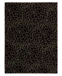 Silhouettes of swelling blossoms give this dark modern rug a striking character, woven from the highest quality New Zealand wool yarns. Offering an exceptionally dense and subtle texture, the Camilla presents a distinctive, abstract floral design in black and ivory colorways. Silhouettes of swelling blossoms give this dark modern rug a striking character, woven from the highest quality New Zealand wool yarns. Offering an exceptionally dense and subtle texture, the Camilla presents a distinctive, abstract floral design in black and ivory colorways.