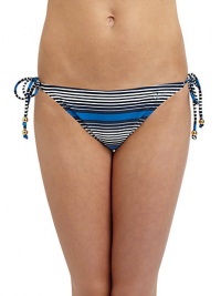 THE LOOKMultistripe printElastic waist and leg openingsLogo-embossed button at one sideSide tiesTHE MATERIAL80% nylon/20% spandexFully linedCARE & ORIGINHand washImportedPlease note: Bikini top sold separately. 