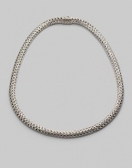 A gracious ribbon of woven sterling silver in a substantial oval shape is both classic and modern. Sterling silver Length, about 18 Hidden barrel push-lock clasp Made in Bali Please note: Chain sold separately. 