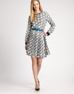 An allover-zebra pattern gives this silk silhouette a playful edge.Jewel neckline with covered button closureFront placketLong sleeves with contrast button cuffsInverted back pleatSilkDry cleanMade in ItalyModel shown is 5'11½ (181cm) wearing US size 4. 
