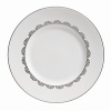 Vera Wang introduces Flirt fine bone china dinnerware. This platinum banded pattern features a modern scallop lace motif and a contemporary take on traditional lace work. Decoration on the inner verge of the accent plate, bread and butter and tea saucer adds a flirtatious touch of whimsy.