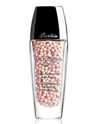 For skin that seems lit from within, apply this smoothing liquid to clean, moisturized skin as an essential first step in any makeup routine. The gel formula, the first makeup base with pearls of light, is made of an exclusive colour control base to camouflage blemishes and discoloration, combined with pearlescent extracts to capture and reflect light and blur the appearance of fine lines without adding shine. In one step, this extraordinary formula perfects the complexion, and can be used before makeup or on its own. For skin that seems lit from within, apply this smoothing liquid to clean, moisturized skin as an essential first step in any makeup routine. The gel formula, the first makeup base with pearls of light, is made of an exclusive colour control base to camouflage blemishes and discoloration, combined with pearlescent extracts to capture and reflect light and blur the appearance of fine lines without adding shine. In one step, this extraordinary formula perfects the complexion, and can be used before makeup or on its own.