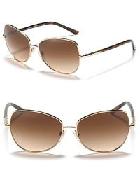 Be seen in the sun in these elegant butterfly-shaped aviator shades from Burberry. Be seen in the sun in these elegant butterfly-shaped aviator shades from Burberry.