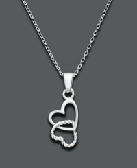 Hang on tight to the one you love. This delicate pendant features two hearts intertwined, one smooth and one textured. Unwritten necklace crafted in sterling silver. Approximate length: 18 inches. Approximate drop 1 inch. Hang on tight to the one you love. This delicate pendant features two hearts intertwined, one smooth and one textured. Unwritten necklace crafted in sterling silver. Approximate length: 18 inches. Approximate drop 1 inch.