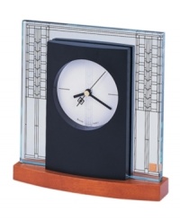 Adapted from the art glass window in the living room of the W. A. Glasner House in Glencoe, Illinois, circa 1905, this desk clock from the Frank Lloyd Wright collection is a contemporary conversation piece. Etched glass and round dial featuring three hands is set in a solid wood base with light cherry stain.