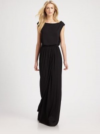 Complemented by an elastic waistband, this slightly shirred maxi dress has a boatneck, cap sleeves and sultry side slit. BoatneckCap sleevesElastic waistbandSide slitAbout 40 from natural waist92% modal/8% spandexDry cleanMade in USAModel shown is 5'10 (177cm) wearing US size Small. Complemented by an elastic waistband, this slightly shirred maxi dress has a boatneck, cap sleeves and sultry side slit. BoatneckCap sleevesElastic waistbandSide slitAbout 40 from natural waist92% modal/8% spandexDry cleanMade in USAModel shown is 5'10 (177cm) wearing US size Small.