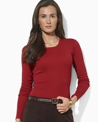 Crafted with a sleek crew neckline and long sleeves, this soft cotton tee is essential both for layering and wear-alone style. Crafted with a sleek crew neckline and long sleeves, this soft cotton tee is essential both for layering and wear-alone style.