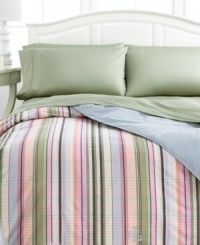 Show off your softer side with the incredibly cozy Martha's Vineyard down-alternative comforter from Lauren Ralph Lauren. This plush comforter boasts a pattern of preppy stripes on one side and soothing blue solid on the other, accented with an embroidered Lauren Ralph Lauren monogram at the base. Finished with stitched edges. Show off your softer side with the incredibly cozy Martha's Vineyard down-alternative comforter from Lauren Ralph Lauren. This plush comforter boasts a pattern of preppy stripes on one side and soothing blue solid on the other, accented with an embroidered Lauren Ralph Lauren monogram at the base. Finished with stitched edges.