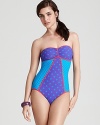 MARC BY MARC JACOBS cleo print suit brings patchwork patterns to your swimwear selection. A charming choice for the beach or pool.