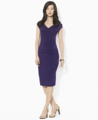 Lauren Ralph Lauren's figure-flattering jersey dress is updated with a crossover V-neckline and cap sleeves for a look that easily transitions from work to weekend. Lauren Ralph Lauren's figure-flattering jersey dress is updated with a crossover V-neckline and cap sleeves for a look that easily transitions from work to weekend.
