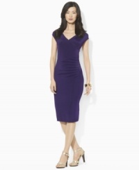 Lauren Ralph Lauren's figure-flattering jersey dress is updated with a crossover V-neckline and cap sleeves for a look that easily transitions from work to weekend.