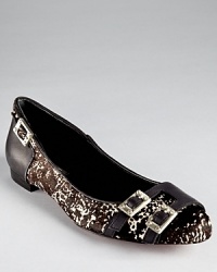 Black, white and buckled, Rachel Zoe's calf hair Lindsey flats boast a spotted print and hits of hardware. Black, white and buckled, Rachel Zoe's calf hair Lindsey flats boast a spotted print and hits of hardware.