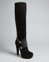 Joan & David sets these buckled-up harness boots apart in high style on lofty platforms.