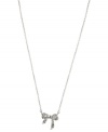 Glistening shine, by Anne Klein. The prettiest finishing touch, this pendant necklace from Anne Klein strings a pave crystal-accented bow on a silver-tone chain. Crafted in silver tone mixed metal. Approximate length: 16 inches + 2-inch extender. Approximate drop: 1/2 inch.