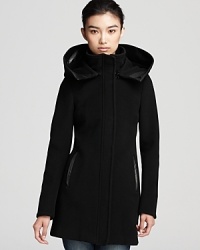 A voluminous funnel collar and leather accents lend luxe style to this A-line coat from Mackage. A voluminous funnel collar and leather accents lend luxe style to this A-line coat from Mackage.