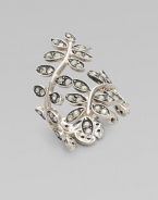 A delicate branch, with leaves of shimmering Swarovski crystal, curves gracefully around the finger in this elegant design.Crystal Sterling silver Length, about 1½ Made in Italy