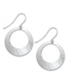 A touch of silver. Giani Bernini's pretty and petite open circle earrings feature a unique hammered surface in sterling silver. Approximate drop: 1 inch.