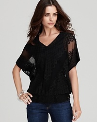 Ornately detailed, this GUESS top transitions effortlessly from day to night. Ornately detailed, this GUESS top transitions effortlessly from day to night.