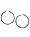 Haute hoops. This pair of earrings from T Tahari's Essentials Collection is crafted from silver-tone mixed metal with a link design adding a stylish touch. Approximate diameter: 1-13/16 inches.