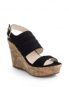 THE LOOKOpen toeRich suede atop a cork wedge with golden touchesSeamed detailing on topAdjustable back strapPadded insoleTHE FITCork-covered wedge 4 (100mm)Cork-covered platform, 1 (25mm)Compares to a 3 heel (75mm)THE MATERIALSuede upperLeather lining and soleORIGINMade in Italy