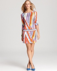 Hot-hued stripes dart across this silky Juicy Couture shift for a '70s-inspired take on evening wear. Hot-hued stripes dart across this silky Juicy Couture shift for a '70s-inspired take on evening wear.
