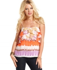 Soak-up some rays in this femme and colorful top from GUESS?, where a bodice of asymmetrical ruffles compliments a relaxed silhouette! Soak-up some rays in this femme and colorful top from GUESS?, where a bodice of asymmetrical ruffles compliments a relaxed silhouette!