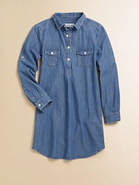 A go-with-anything wardrobe essential, the denim chambray shirt dress is classic and cool with signature embroidery in a snap-front design.Shirt collarLong sleeves with roll-tab snap cuffsSnap-frontFront snap-flap pocketsBack yokeShirttail hemCottonMachine washImported Please note: Number of snaps may vary depending on size ordered. A go-with-anything wardrobe essential, the denim chambray shirt dress is classic and cool with signature embroidery in a snap-front design.Shirt collarLong sleeves with roll-tab snap cuffsSnap-frontFront snap-flap pocketsBack yokeShirttail hemCottonMachine washImported Please note: Number of snaps may vary depending on size ordered.