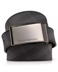 Leather dress belt with polished, plaque buckle. Check pattern throughout. Leather dress belt with polished, plaque buckle. Check pattern throughout.