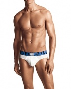 Body defining fit in stretch cotton modal hip briefs. Comfort of cotton with the softness of modal seamlessly blend. Flat lock closures for comfort against the body. Thin large logo waistband in black and blue with X sewn patch.