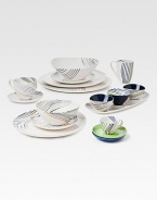 Another of Diane's statement designs, infusing subtle color and movement to any table in gleaming glass. From the Streamline Collection1H X 7 diam.GlassHand washImported